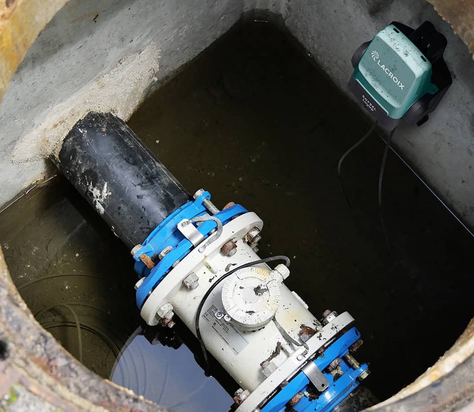 Remote reading of flow rates in district metering areas